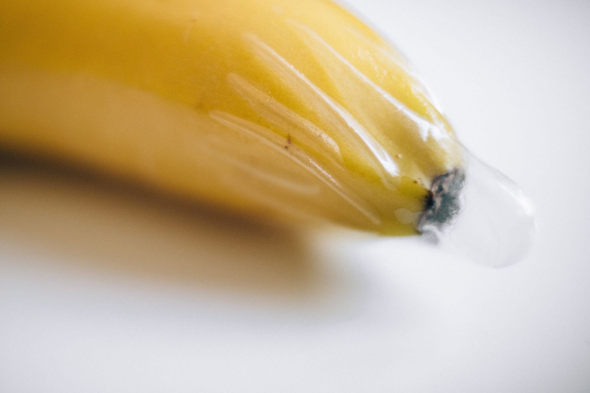 Image of a banana with condom