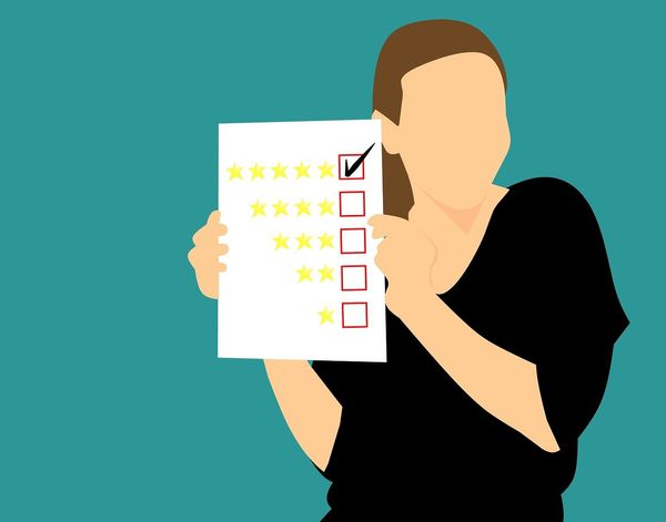 An illustration of a person giving 5-star rating